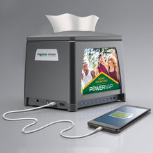 Load image into Gallery viewer, Black PowerNap dispenser with built in charger with phone plugged in and charging